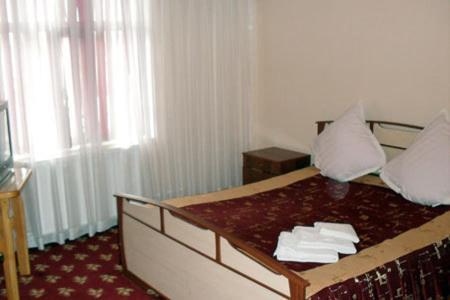 Grand Tashkent Hotel Quarto foto